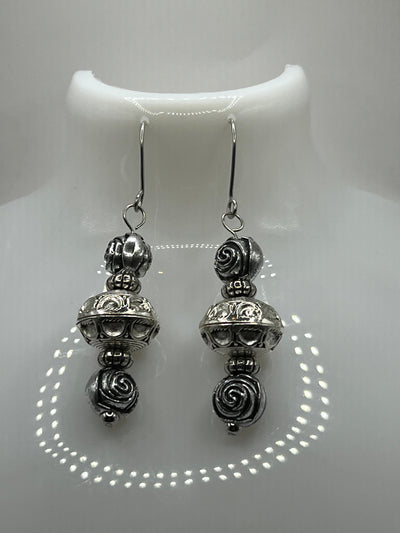 TheJingly Jangly Metal Flower Earrings image 0