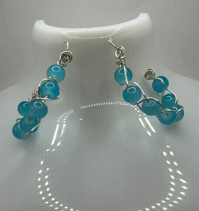 The Criss Cross Light Blue Glass Earrings image 0