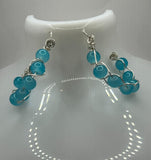 The Criss Cross Light Blue Glass Earrings image 0