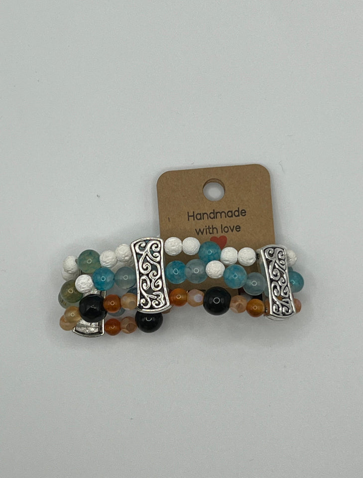 The Swirls & Beautiful Colours gemstone triple strand - Kel’s Lampworked Glass Jewellery & More