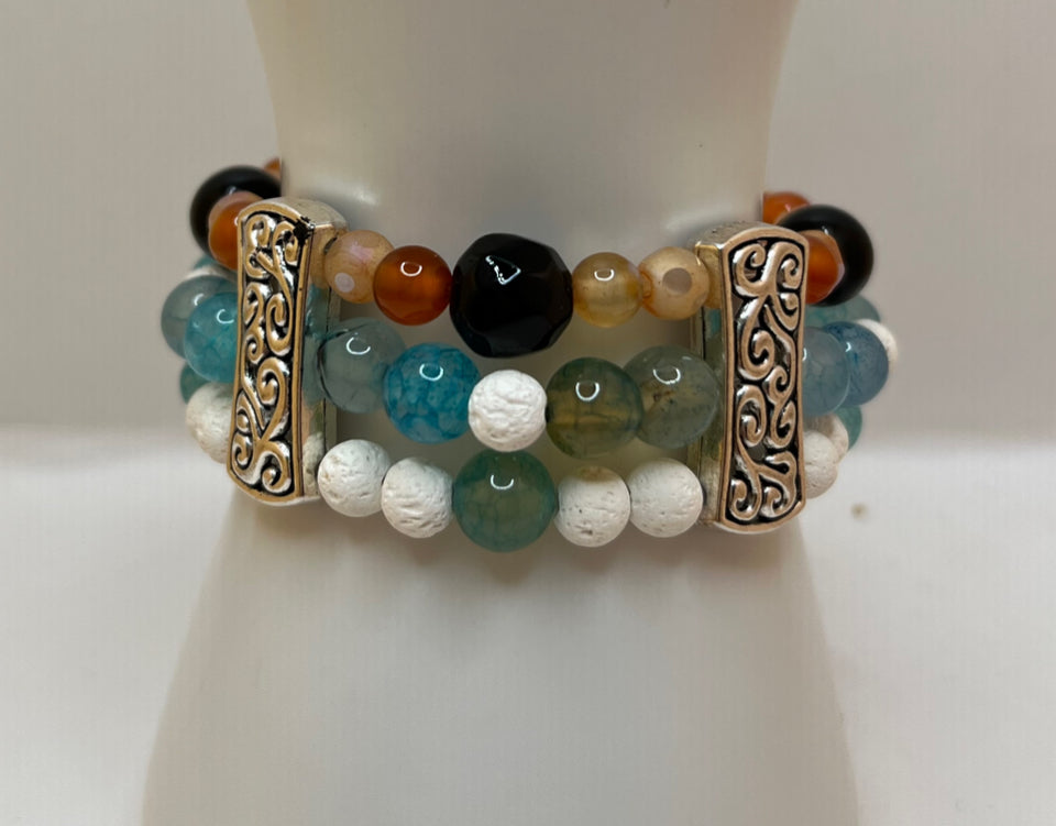 The Swirls & Beautiful Colours gemstone triple strand - Kel’s Lampworked Glass Jewellery & More