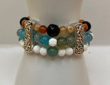 The Swirls & Beautiful Colours gemstone triple strand - Kel’s Lampworked Glass Jewellery & More