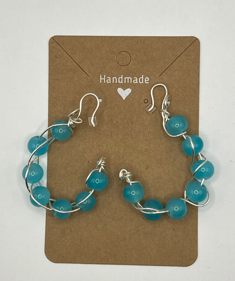 The Criss Cross Light Blue Glass Earrings image 2